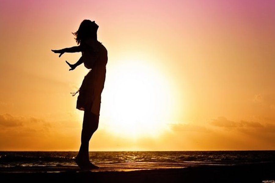 Woman enjoying sunset